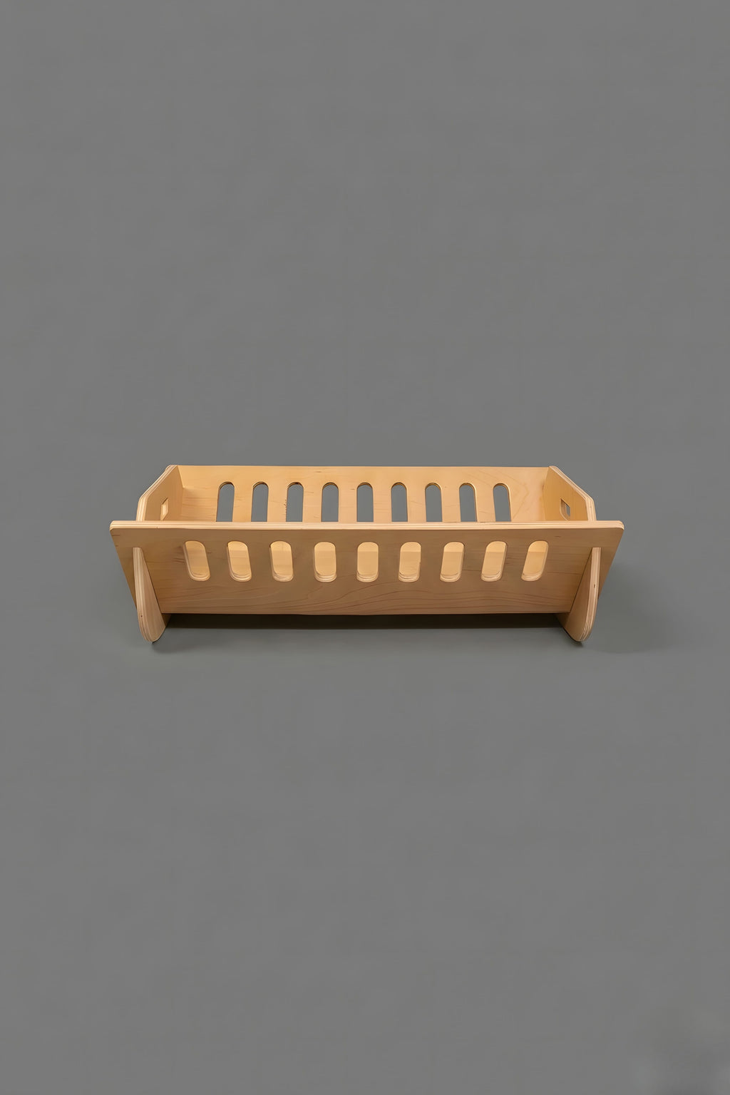 Wooden cot basket style on a gray background